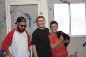 A group of people standing next to each other.